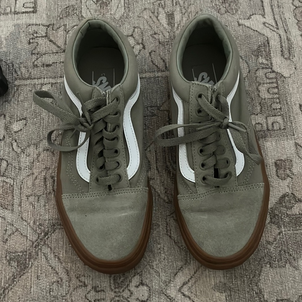 Green and white vans